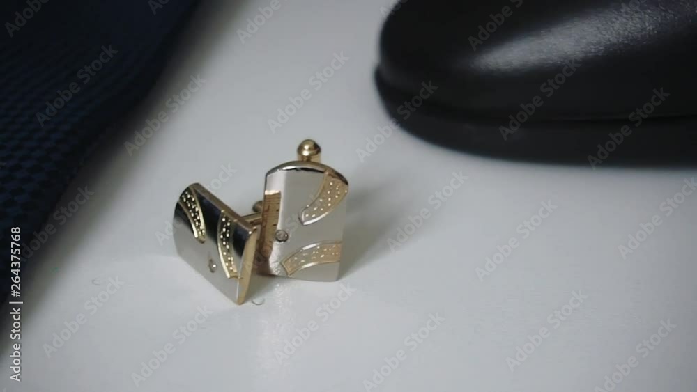 groom's accessories lying on a dark surface, wedding flatlay 1