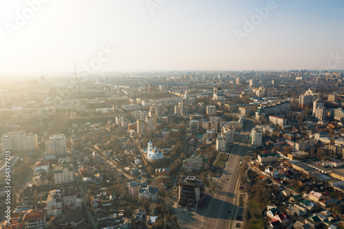 Aerial Voronezh city midtown panorama at sunset  roads with car traffic and buildings  center of old European city in spring