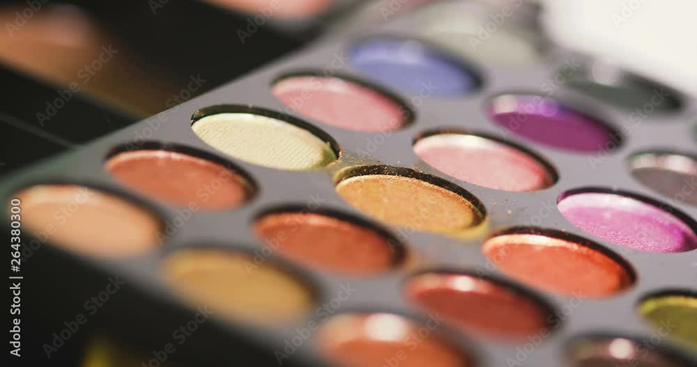Close up cosmetic , makeup , blush on and colorful glamour glitter eyeshadow using , 4k dci resolution Close up cosmetic , makeup , blush on and colorful glamour glitter eyeshadow using , 4k dci resolution