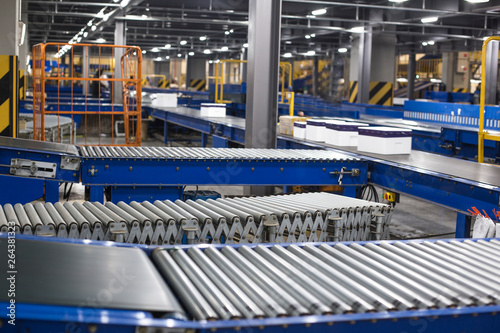 Factory roller conveyor system for transporting crates
