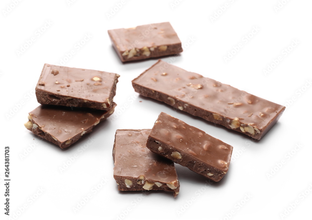 Chocolate with hazelnuts isolated on white background Chocolate with hazelnuts isolated on white background