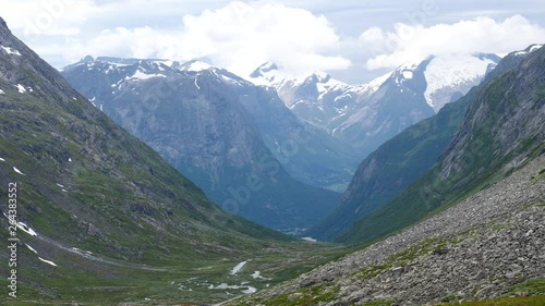 Mountains landscape peaks covered with snow. View from norwegian national tourist scenic route Gamle Strynefjellsvegen, from Grotli to Videseter photo