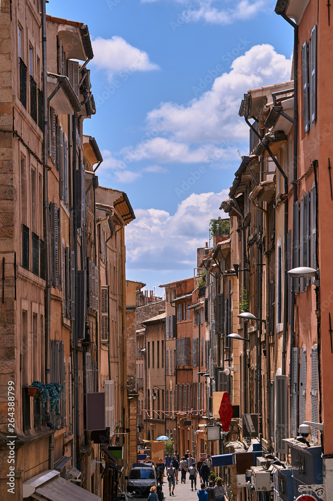 bunk houses on a narrow street in the city of Aix-en-Provence in France.