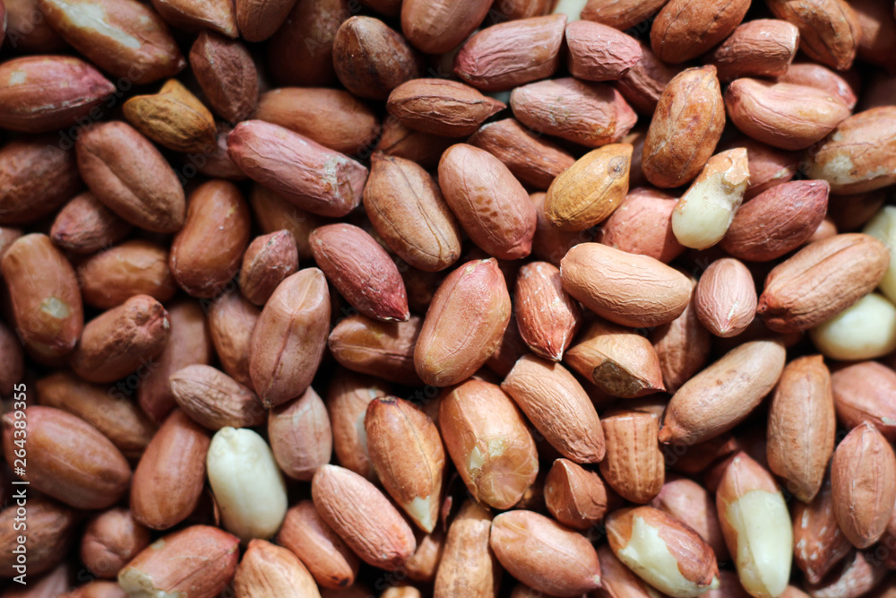 peanut in a shell texture. food background of peanuts peanut in a shell texture. food background of peanuts
