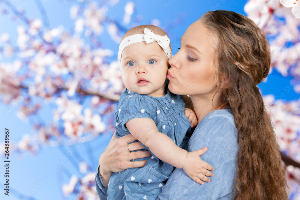 Obraz premium mother hugs a young child