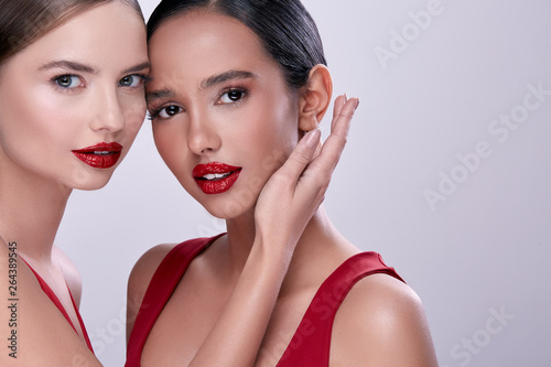 elegance women looking into the camera  gorgeous girls with red lipstick  beautiful females sexy with make-up