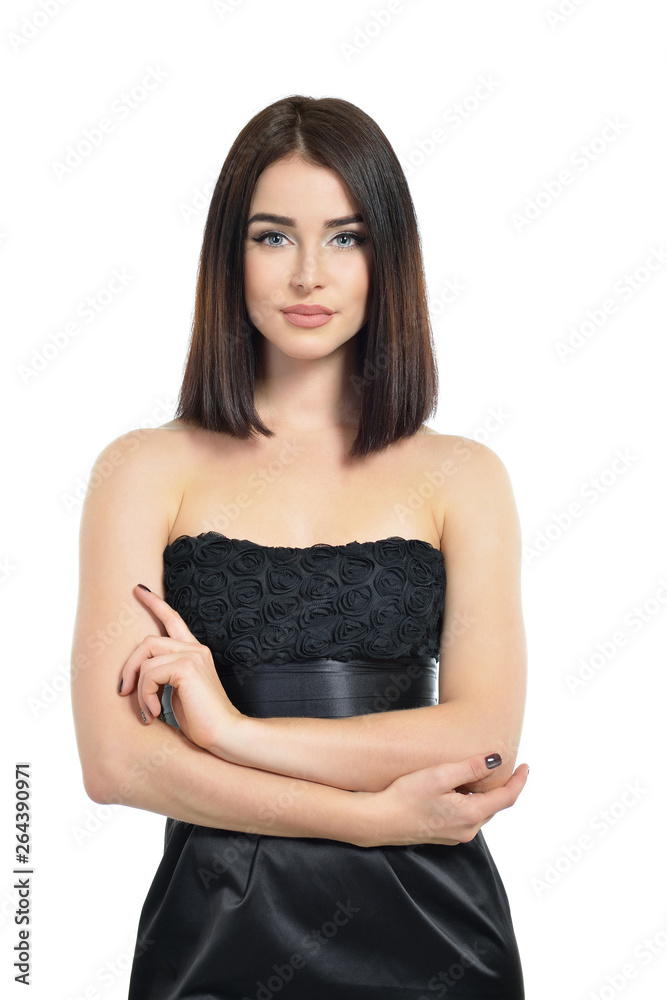 Beauty. Portrait of attractive young woman over white background. Amazing girl wearing black dress with perfect makeup isolated on white background. Beauty. Portrait of attractive young woman over white background. Amazing girl wearing black dress with perfect makeup isolated on white background.