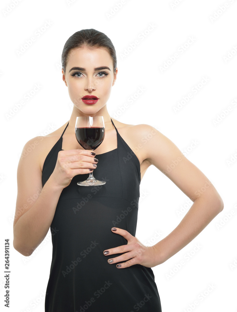Young attractive woman holding glass of red wine. Pretty lady drinks alcoholic drink. Beautiful girl wearing black dress with glass of wine isolated on white background. Young attractive woman holding glass of red wine. Pretty lady drinks alcoholic drink. Beautiful girl wearing black dress with glass of wine isolated on white background.