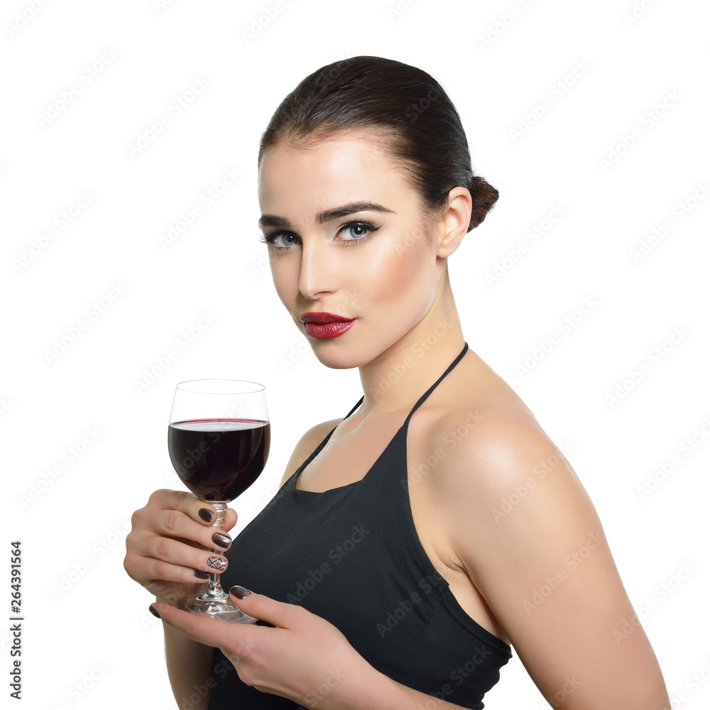 Young attractive woman holding glass of red wine. Pretty lady drinks alcoholic drink. Beautiful girl wearing black dress with glass of wine isolated on white background. Young attractive woman holding glass of red wine. Pretty lady drinks alcoholic drink. Beautiful girl wearing black dress with glass of wine isolated on white background.