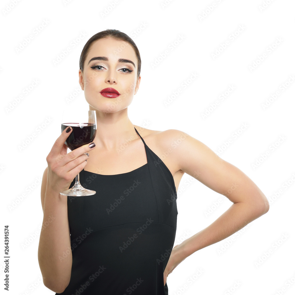 Young attractive woman holding glass of red wine. Pretty lady drinks alcoholic drink. Beautiful girl wearing black dress with glass of wine isolated on white background. Young attractive woman holding glass of red wine. Pretty lady drinks alcoholic drink. Beautiful girl wearing black dress with glass of wine isolated on white background.
