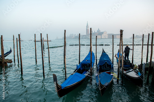 Grand Сhannel with gondola and gondolier, Venice, Italy. Beautiful ancient romantic italian city. © Khorzhevska