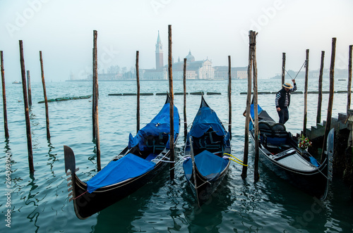 Grand Сhannel with gondola and gondolier, Venice, Italy. Beautiful ancient romantic italian city. © Khorzhevska