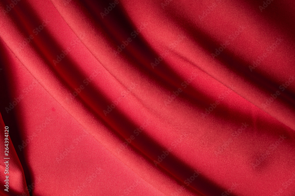 Closeup texture of orange crumpled material Closeup texture of orange crumpled material