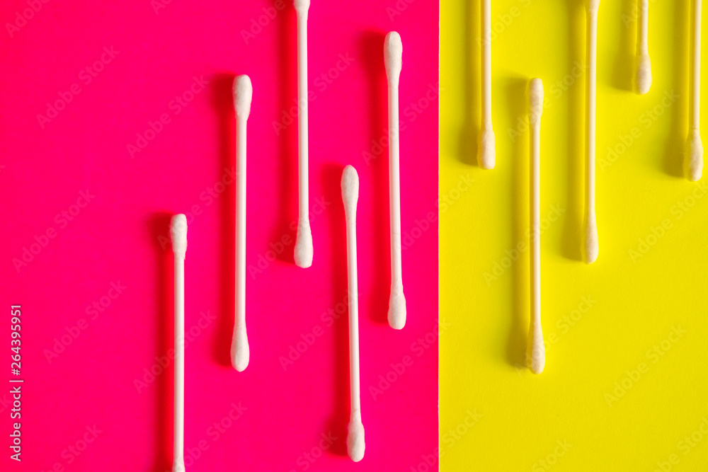 Cotton swab on a pink background. Cotton swab on a pink background.