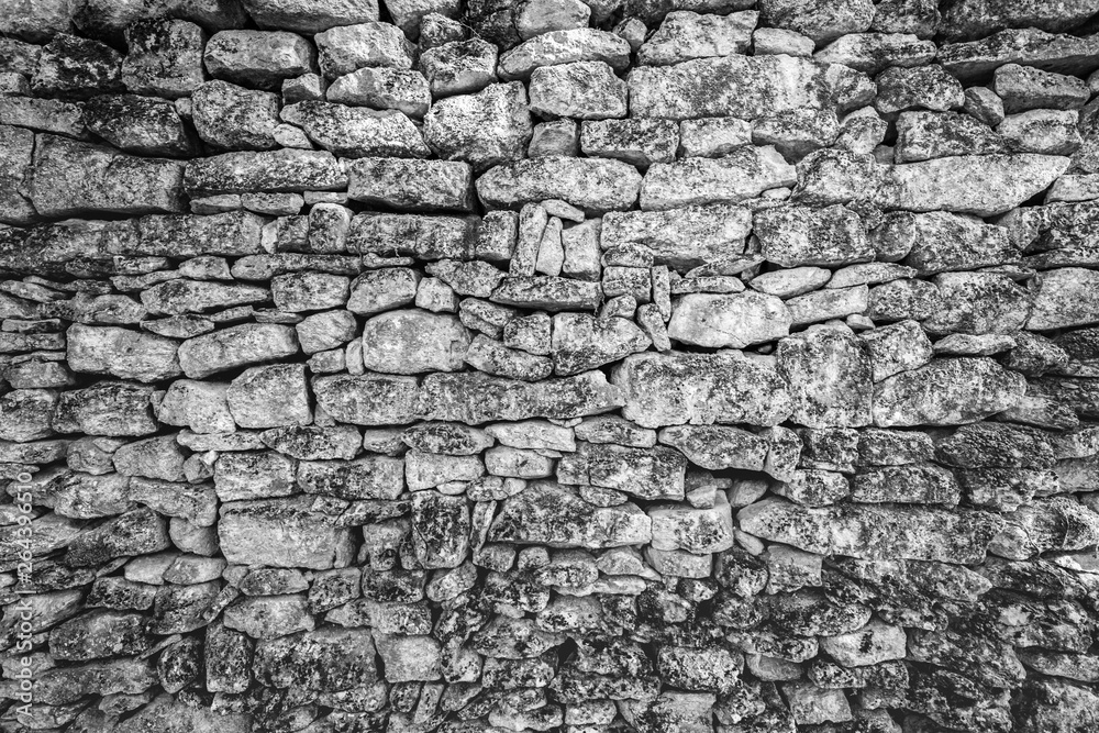 Artistic old wall background of black and white stone wall texture photo Artistic old wall background of black and white stone wall texture photo