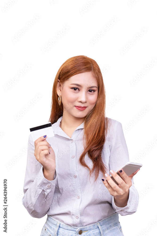 smiling Asian woman in casual shirt holding mobile phone and showing credit card for shopping online while making orders via the internet. studio shoot ,isolated on white background with clipping path smiling Asian woman in casual shirt holding mobile phone and showing credit card for shopping online while making orders via the internet. studio shoot ,isolated on white background with clipping path