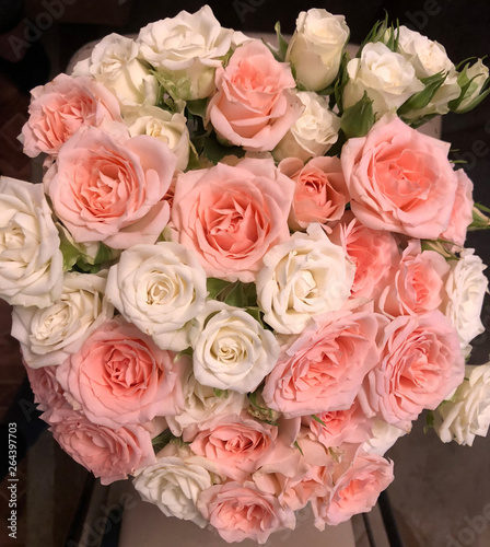 A beautiful bouquet of soft pink and white roses