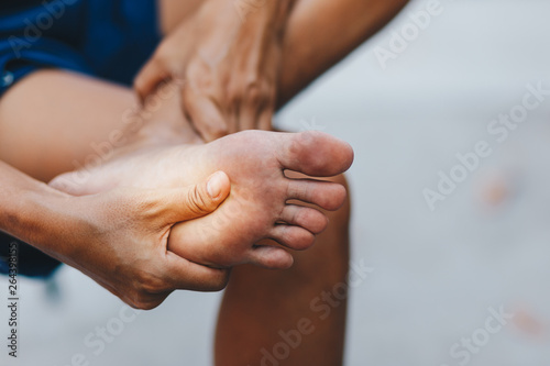 young woman pain in her foot