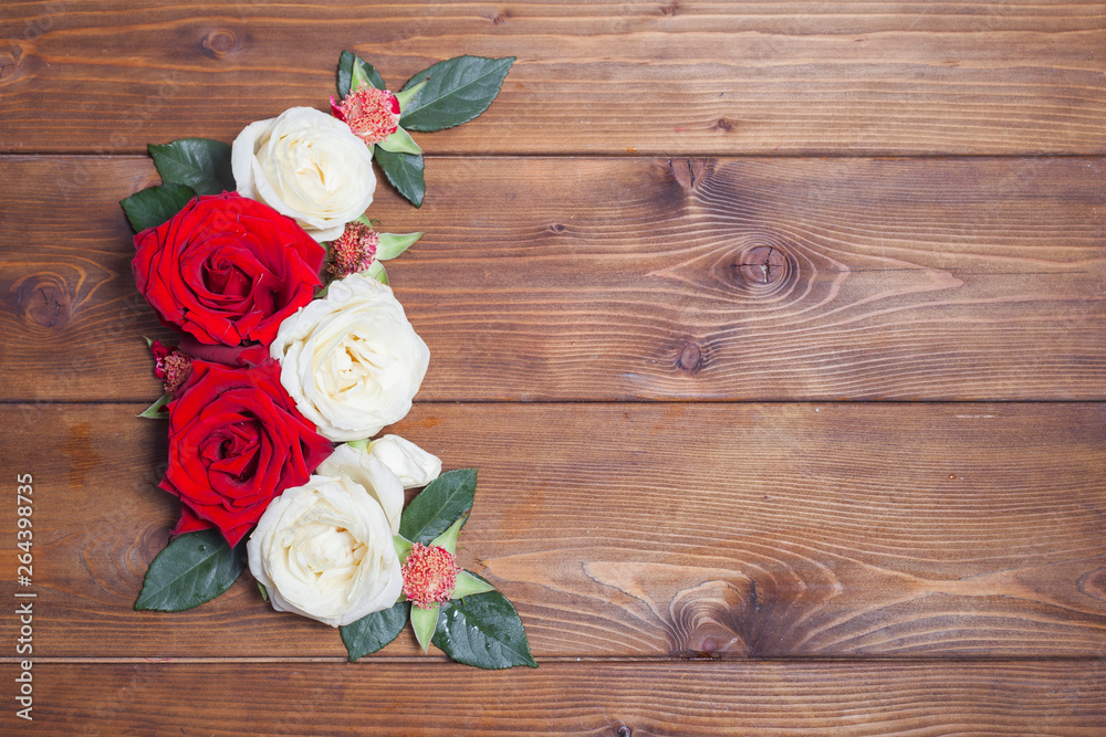 White and red roses decor on wooden background White and red roses decor on wooden background