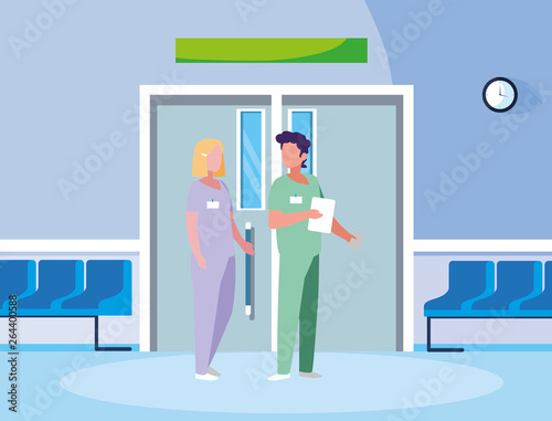 couple medicine workers in elevator door