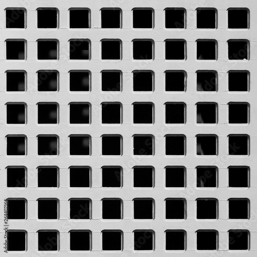 white wall with square hole