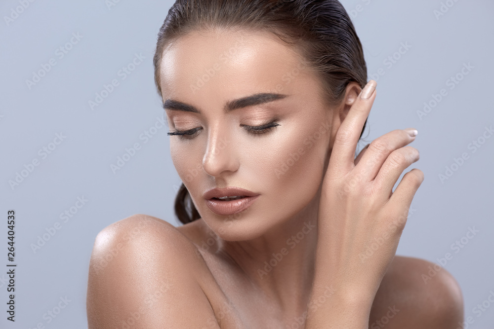 girl touching ear, beautiful woman looking down, pretty female model girl touching ear, beautiful woman looking down, pretty female model