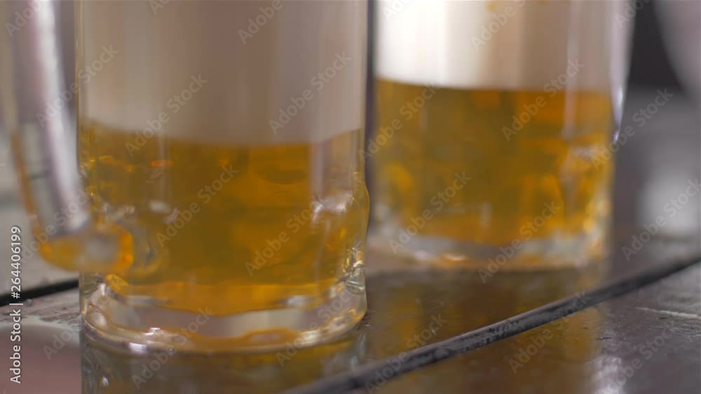 Pouring beer into a mug Pouring beer into a mug