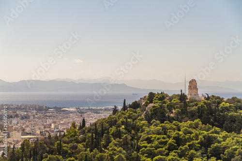 Athens cityscape with the Philopappu Monument and Mediterranean photo