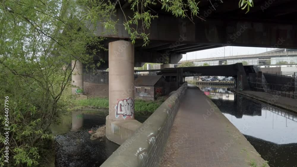 Under Spaghetti Junction. The river Tame and the Birmingham and Fazeley canal under the roadways of the Gravelly Hill Interchange. Under Spaghetti Junction. The river Tame and the Birmingham and Fazeley canal under the roadways of the Gravelly Hill Interchange.