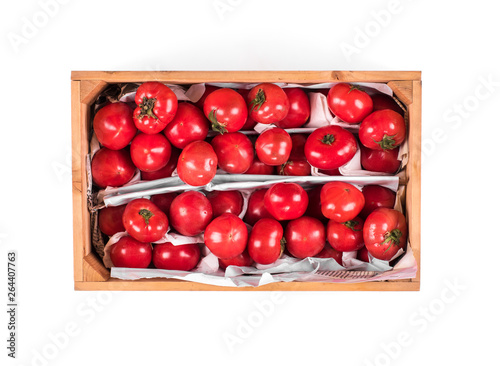 wooden box with red tomatoes on white background