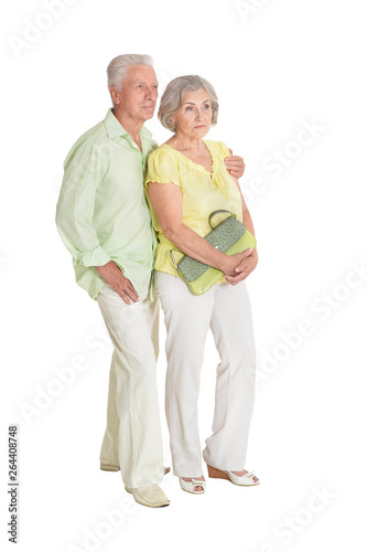 Portrait of happy senior couple posing isolated on white background