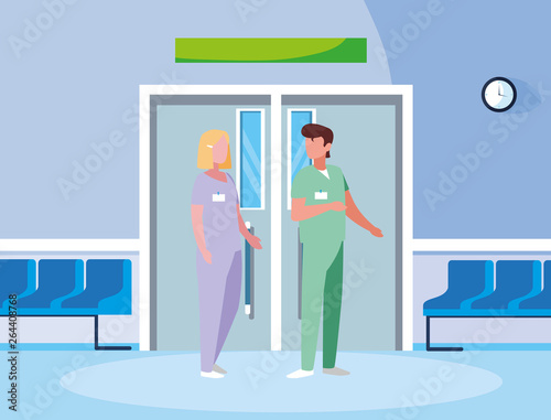 couple medicine workers in elevator door