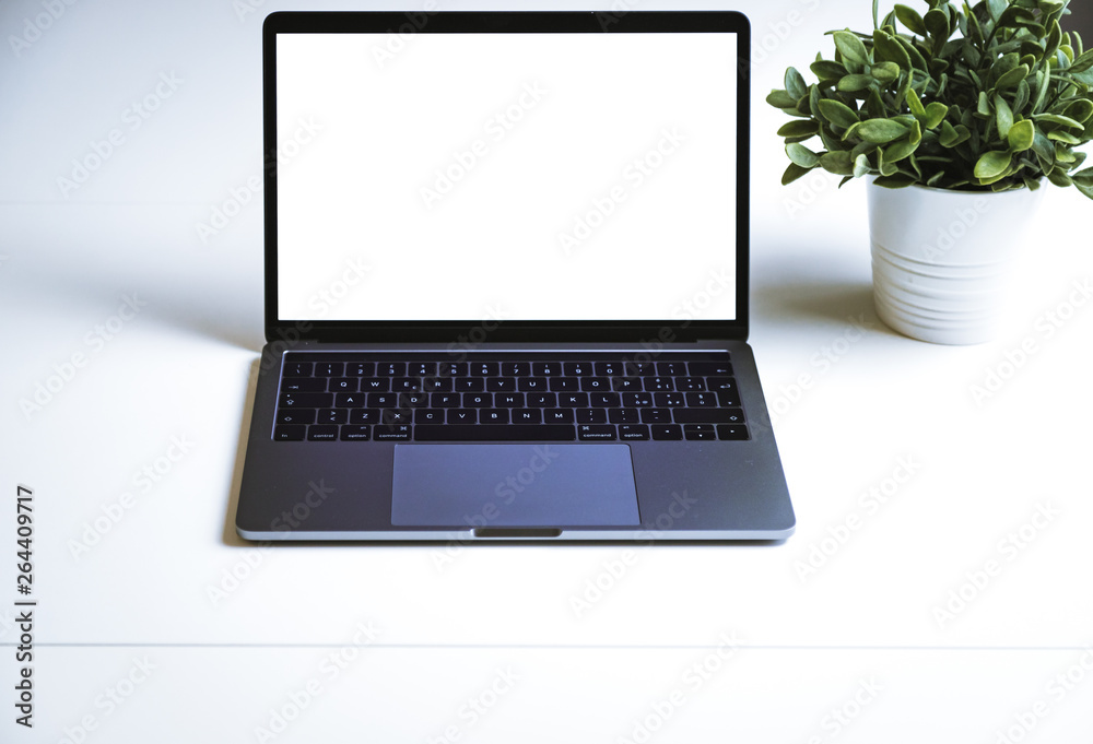 Fototapeta premium Latest generation computer on a table with accessories