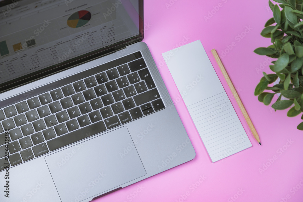 Latest generation computer on a table with accessories