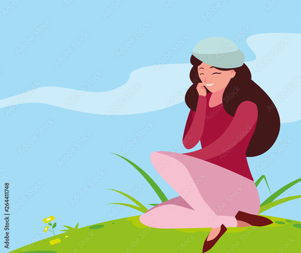 beautiful woman with beret seated in the park
