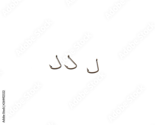 Rusty old fish hook, isolated on white background.