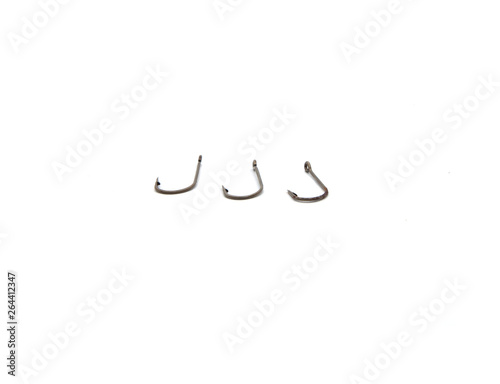 Rusty old fish hook, isolated on white background.