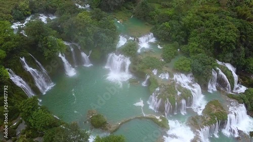 Ban Gioc waterfall or Detian waterfall is a collective name for two waterfalls in border Cao Bang, Vietnam and Daxin County, China. Royalty high-quality free stock photo image of a beautiful waterfall photo