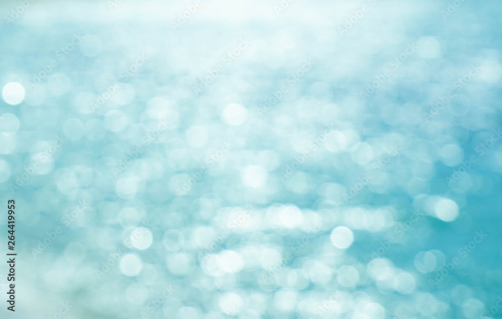 Blur beautiful nature summer on tropical beach with bokeh sun light wave abstract background. Blur beautiful nature summer on tropical beach with bokeh sun light wave abstract background.