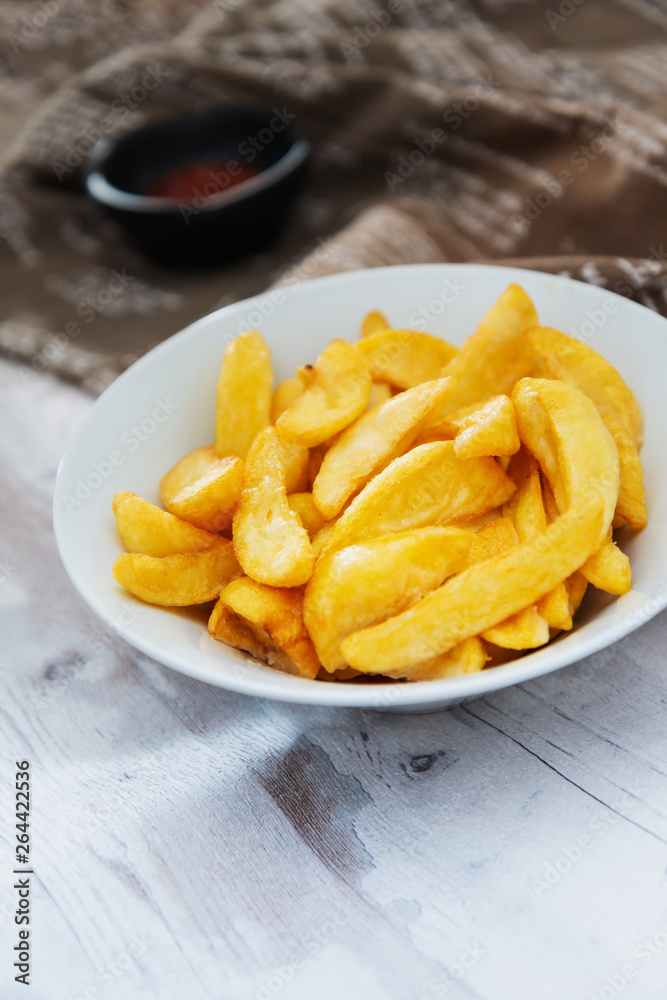 Golden French fries potatoes ready to be eaten Golden French fries potatoes ready to be eaten