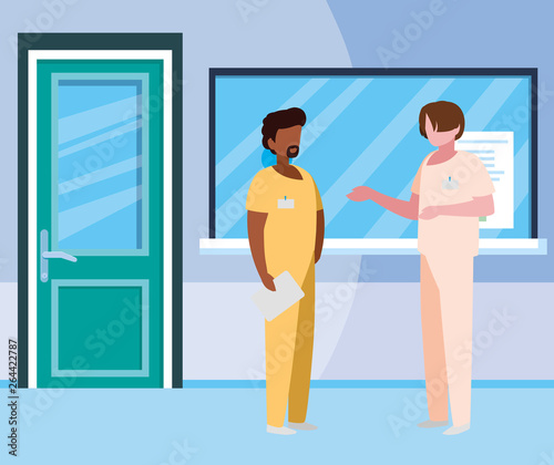 interracial male medicine workers in hospital reception