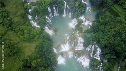 Ban Gioc waterfall or Detian waterfall is a collective name for two waterfalls in border Cao Bang, Vietnam and Daxin County, China. Royalty high-quality free stock video of a beautiful waterfall photo