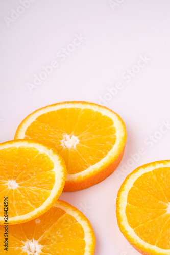 Tropical background orange slices fruits