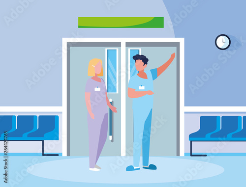couple medicine workers in elevator door