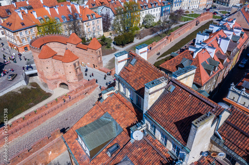 Warsaw, Poland red orange roof in old town market square with historic street town architecture and windows rooftop closeup pattern