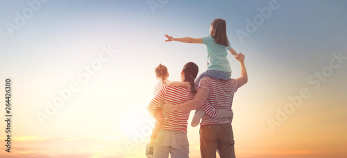 happy family at sunset. photo