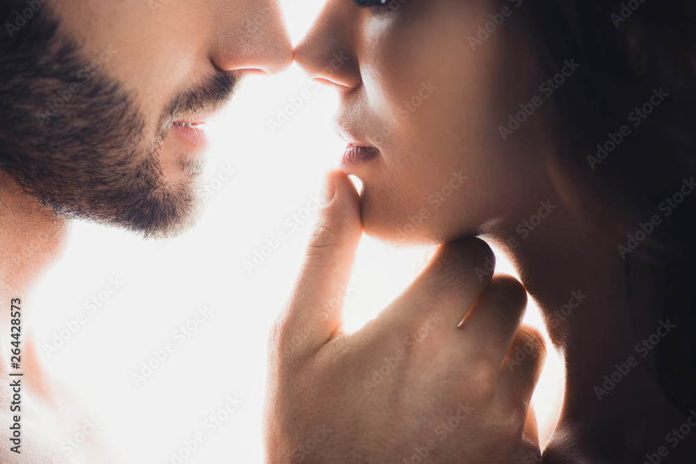 cropped view of man gently touching girlfriend isolated on white cropped view of man gently touching girlfriend isolated on white