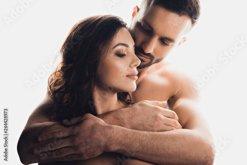 Fotografia, Obraz bearded handsome man embracing girlfriend isolated on white