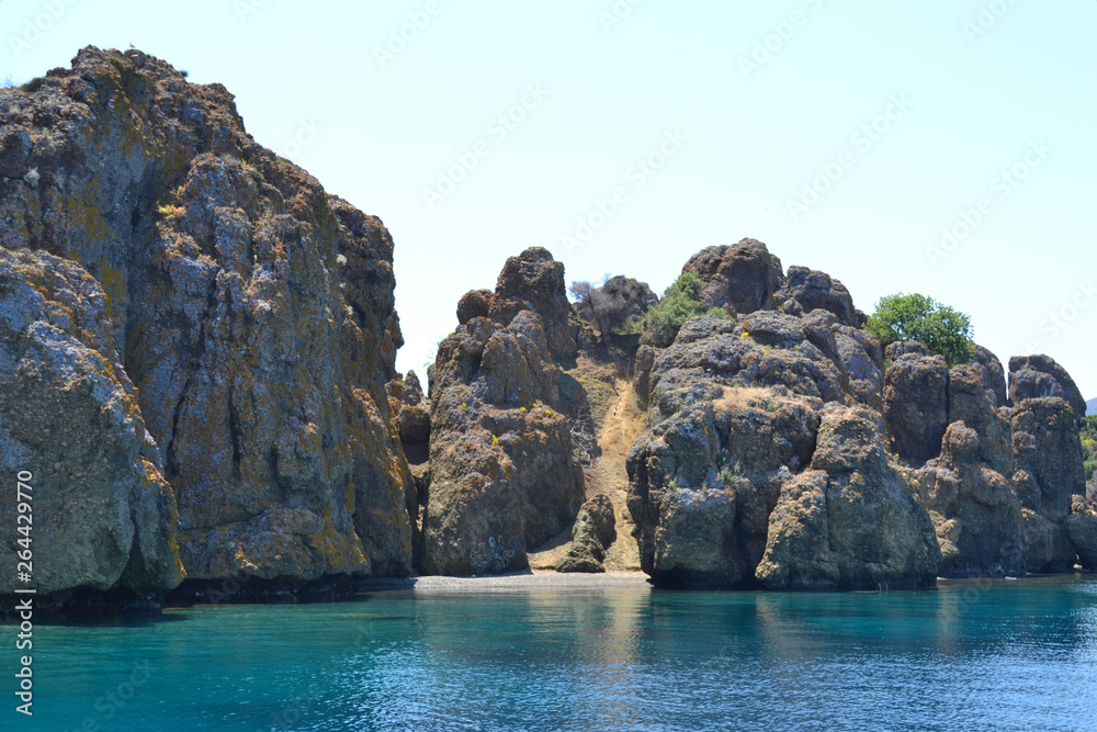 View the stone islands in the Aegean Sea Turkey Greece, rocky coastline deserted near Icmeler Marmaris summer holiday trip Panorama landscape View the stone islands in the Aegean Sea Turkey Greece, rocky coastline deserted near Icmeler Marmaris summer holiday trip Panorama landscape