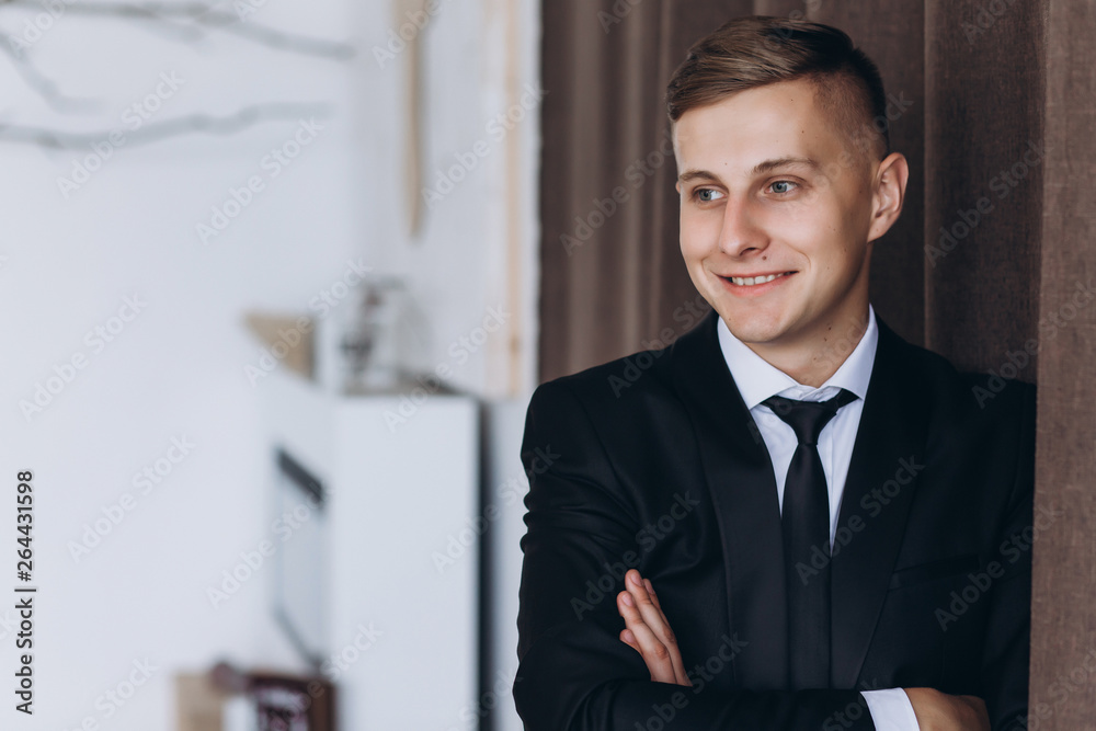 Preparation of the groom for the wedding.